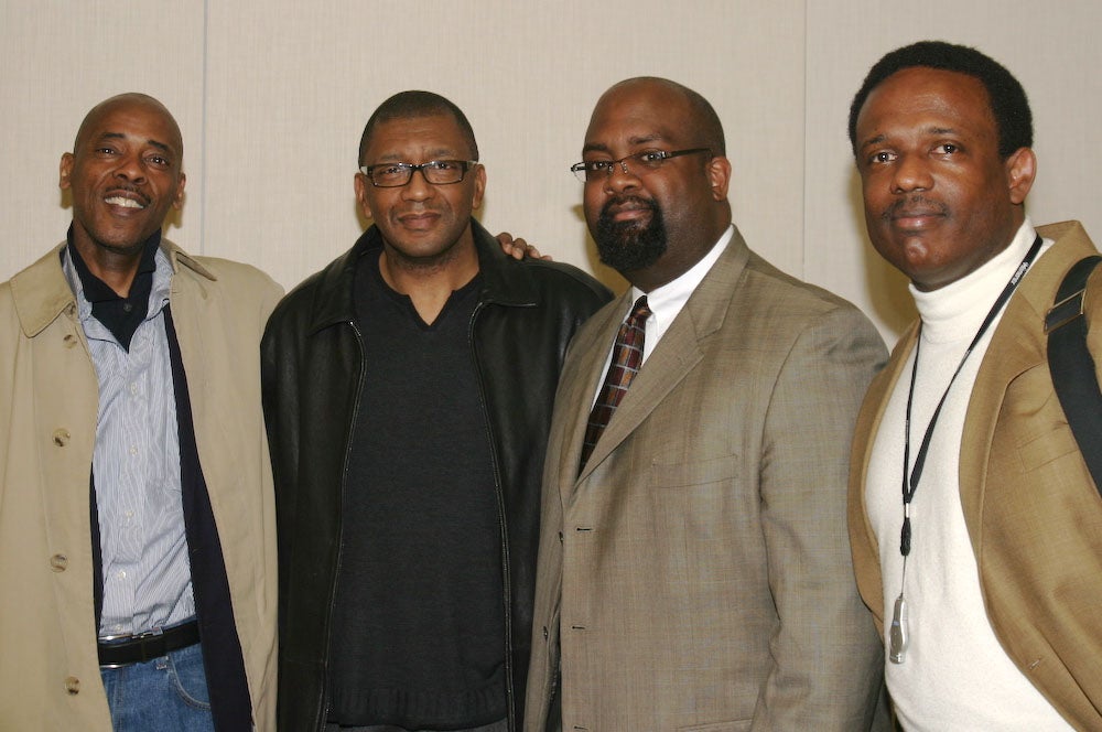 four members of Men of Color program