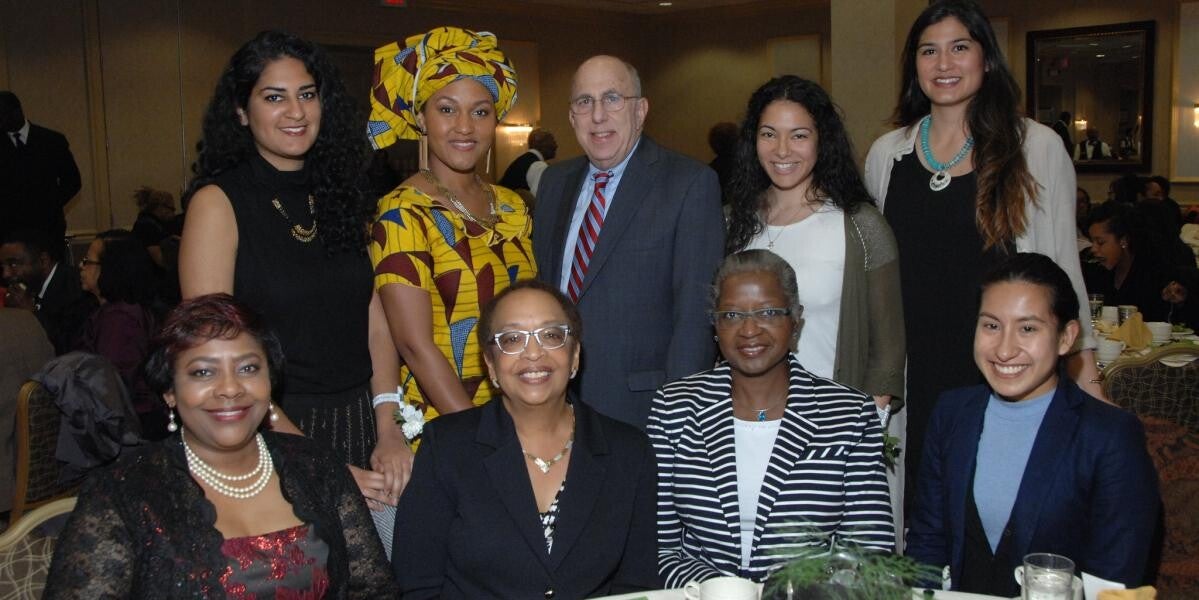 group of leadership and attendees of the Women of Color event
