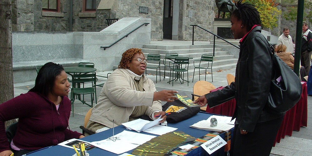 two AARC members sharing information with the public on locust walk