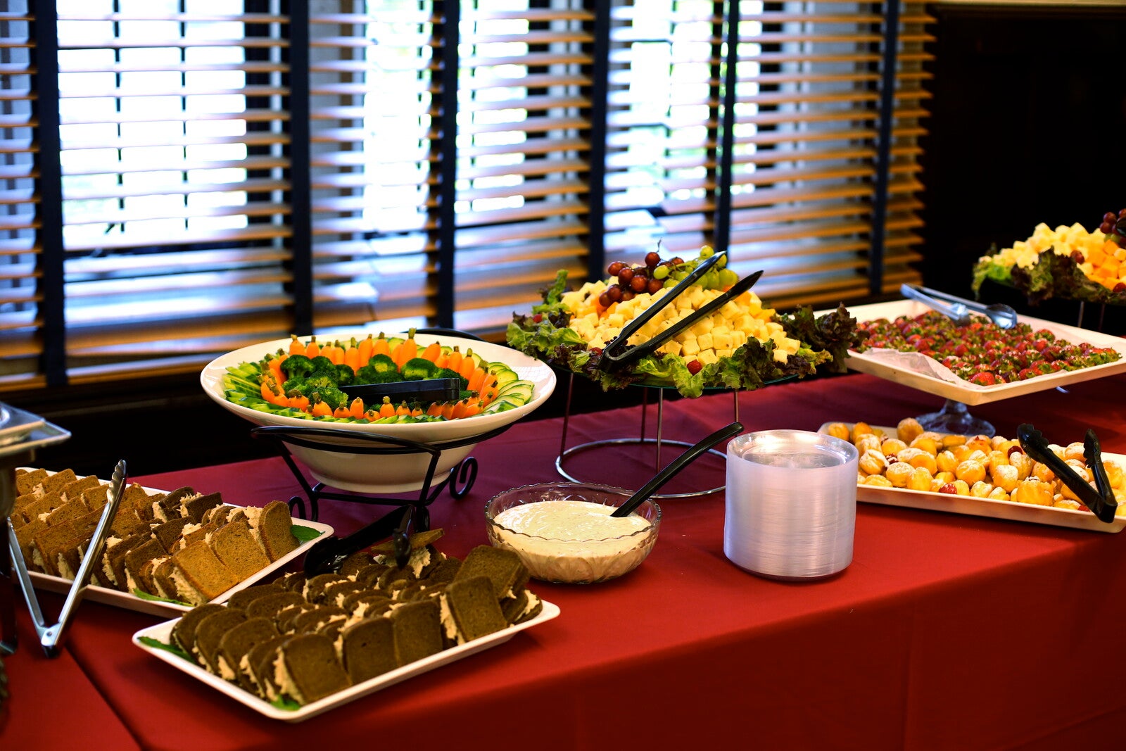 buffet table filled with platters of food