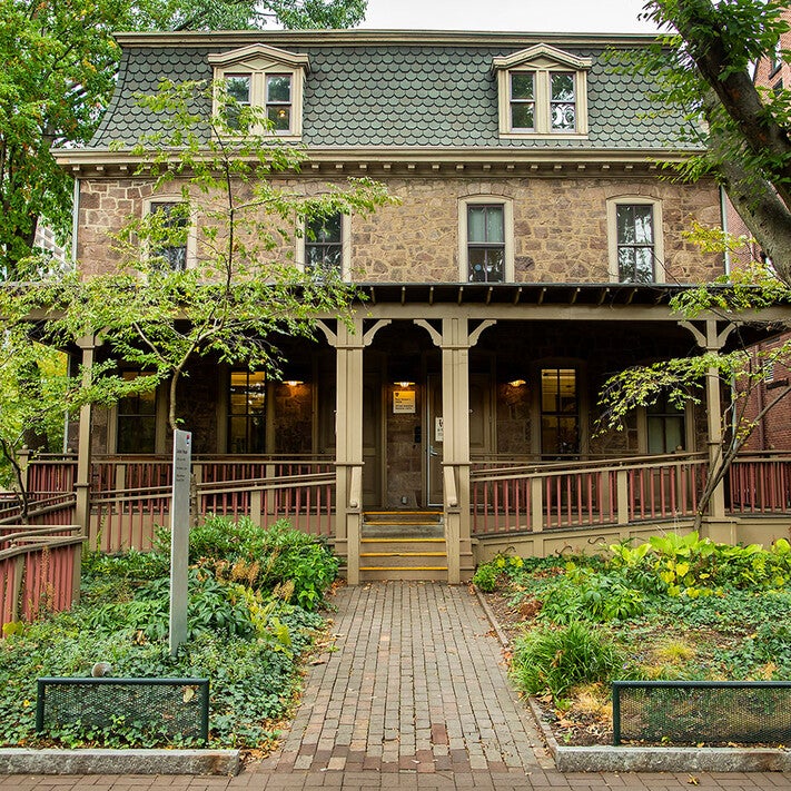 brick path leading to front door of African-American Resource Center's building